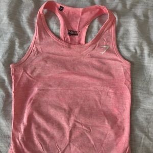 Gymshark racer back pink workout tank top.